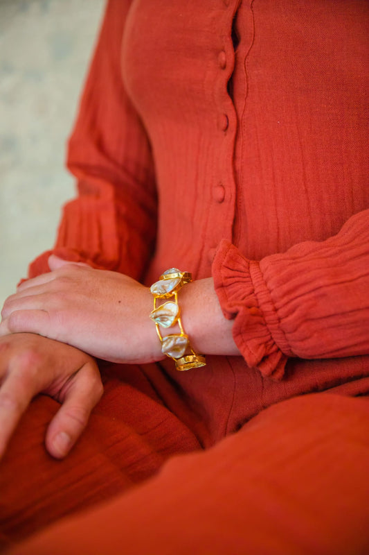 Terracotta Cairo jumpsuit crafted from soft, temperature-adaptive double cheesecloth.