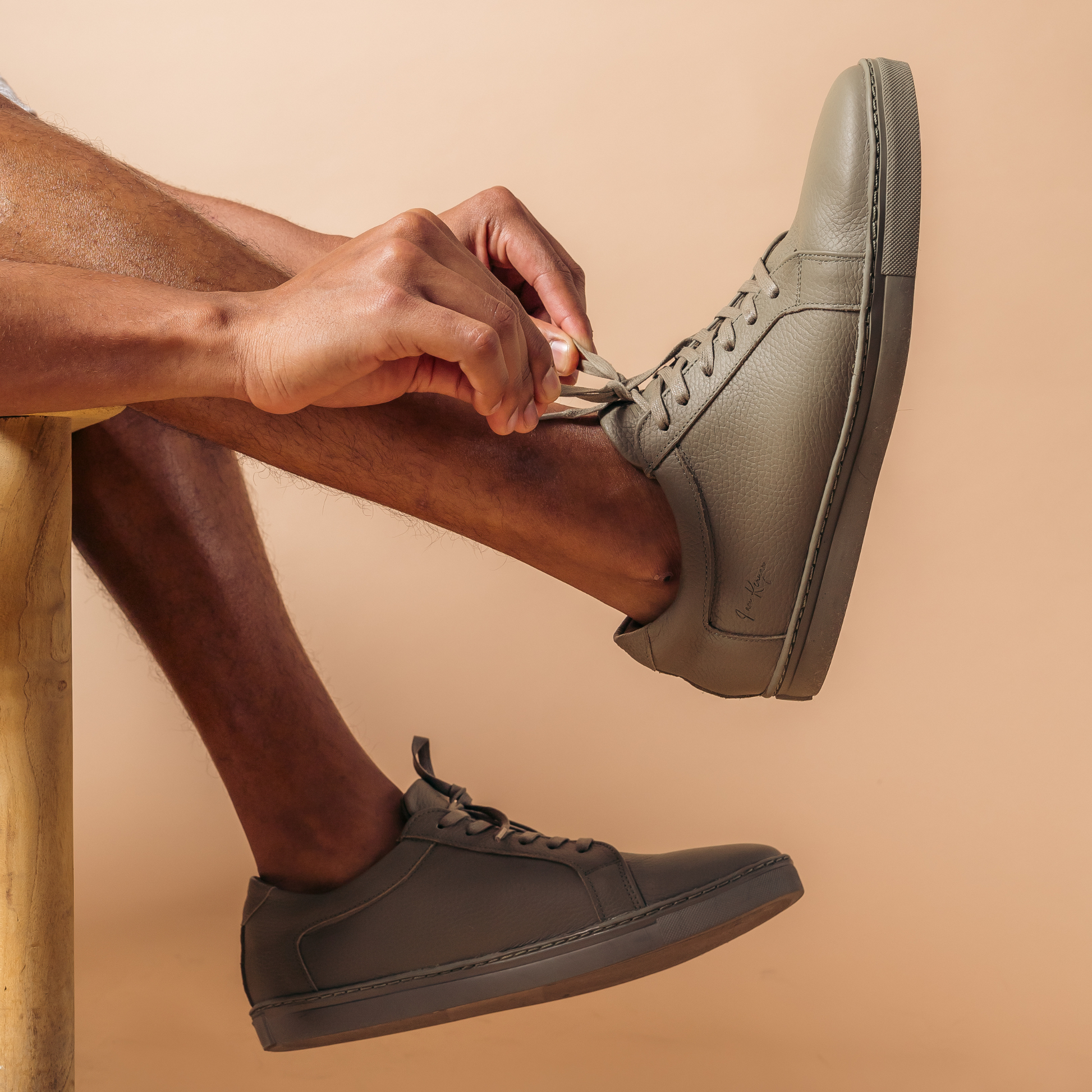 I am Kenyan sneakers in olive green milled leather and royal sole