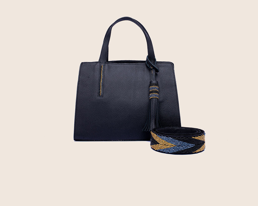 Kate bag in black milled leather and with Maasai beaded strap.