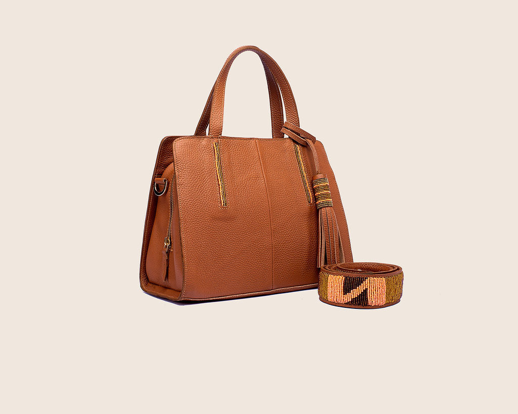 Kate bag in Sugar almond milled leather and with Maasai beaded strap.