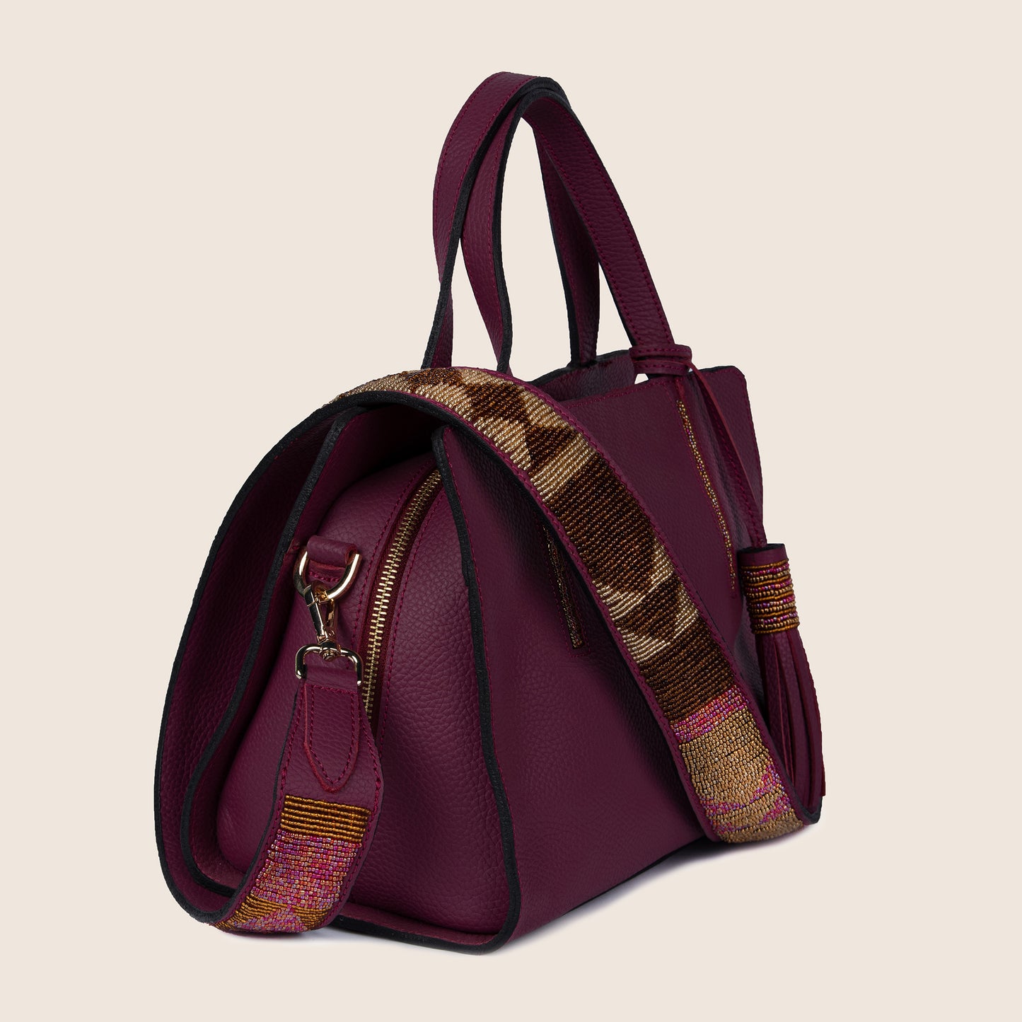 Kate bag in sangaria milled leather and with Maasai beaded strap.