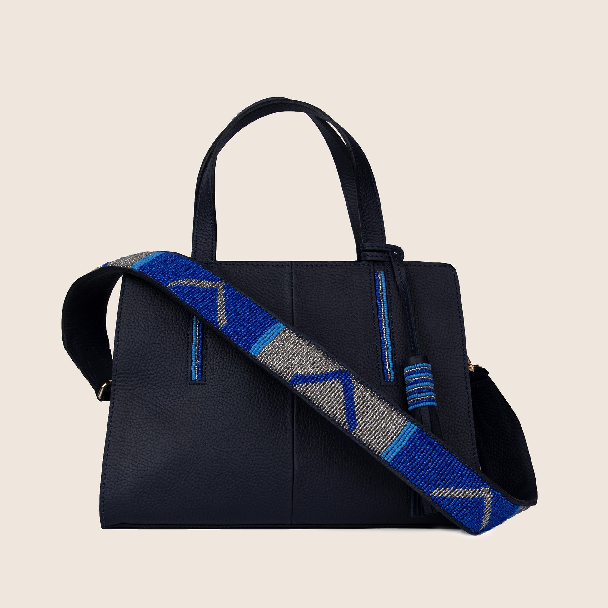 Kate bag in Navy blue milled leather and with Maasai beaded strap.